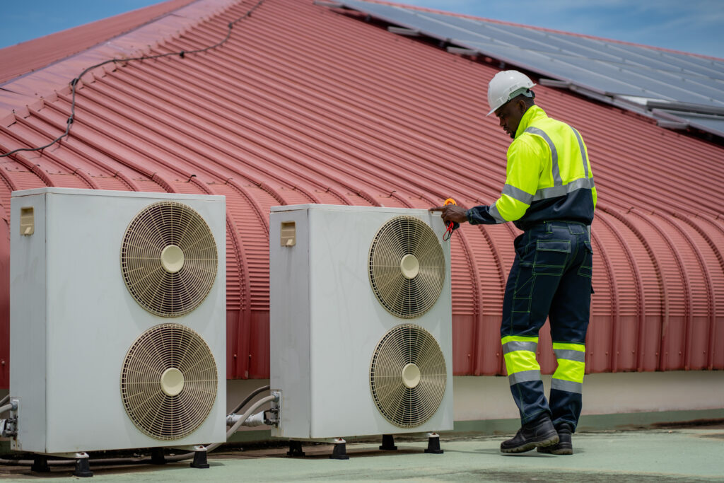 engineers is checking the air conditioning cooling system of a major building or industrial facility.